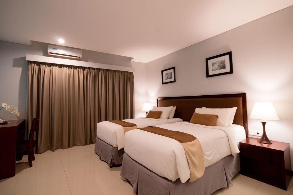 Kutabex Beachfront Hotel Кута Номер фото